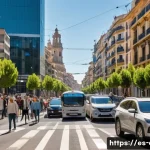 Home 20 소음성 난청 예방을 위한 생활 팁 - A busy urban street scene in a large Spanish city during daytime, showing heavy traffic with cars, b...